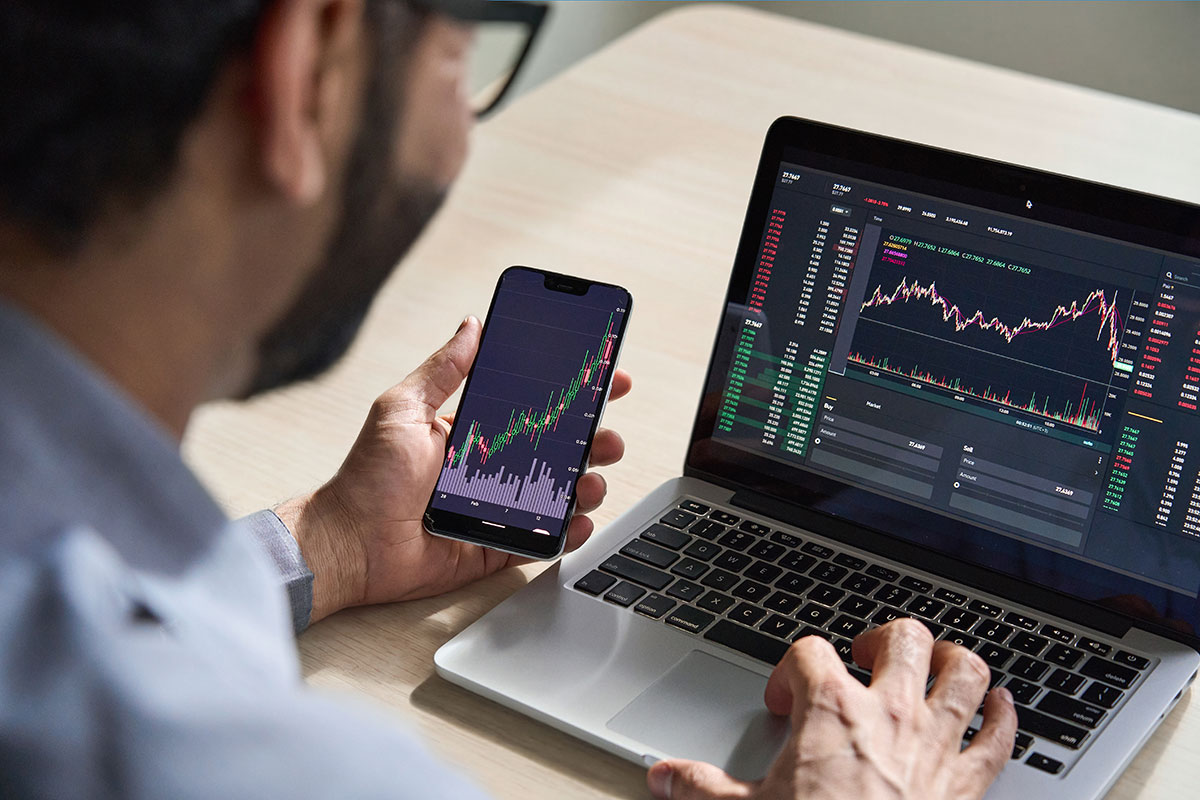 investor looking at stats